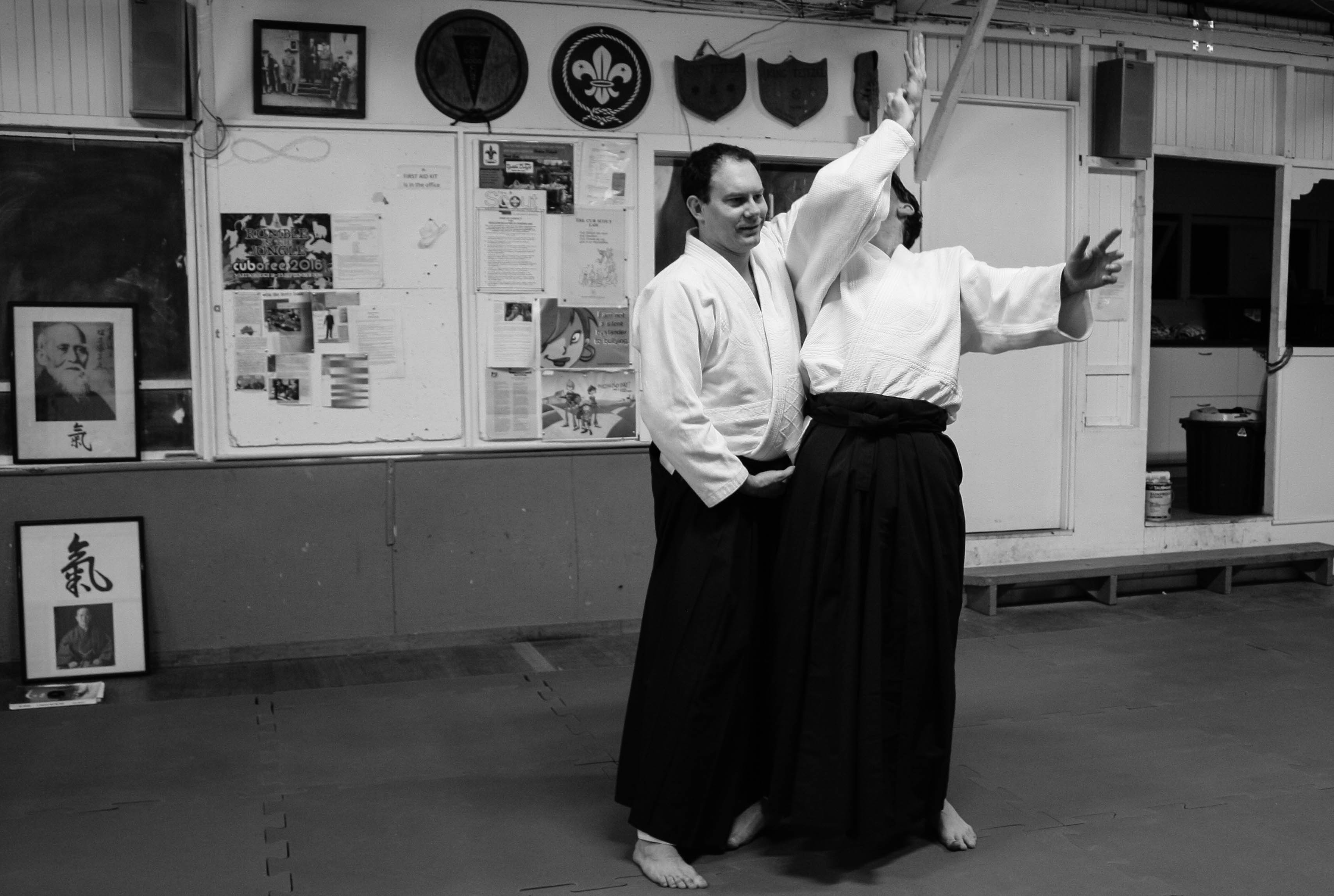 Sensei Harris working through a technique with Sensei Marshall